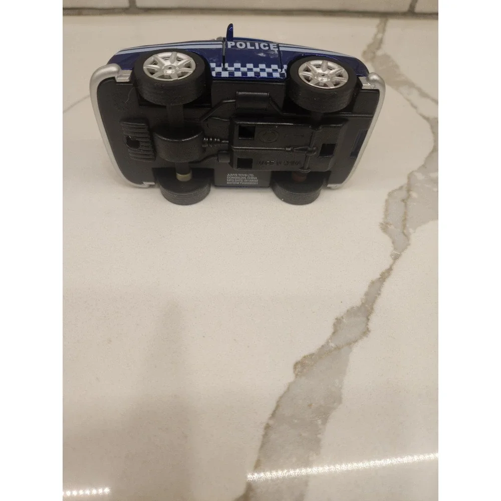 Junye Toys Police Car Sticks tongue out, moves‎ eyes